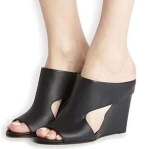 Vince. Size 7.5 black mule wedge sandal. Worn once. Excellent condition.